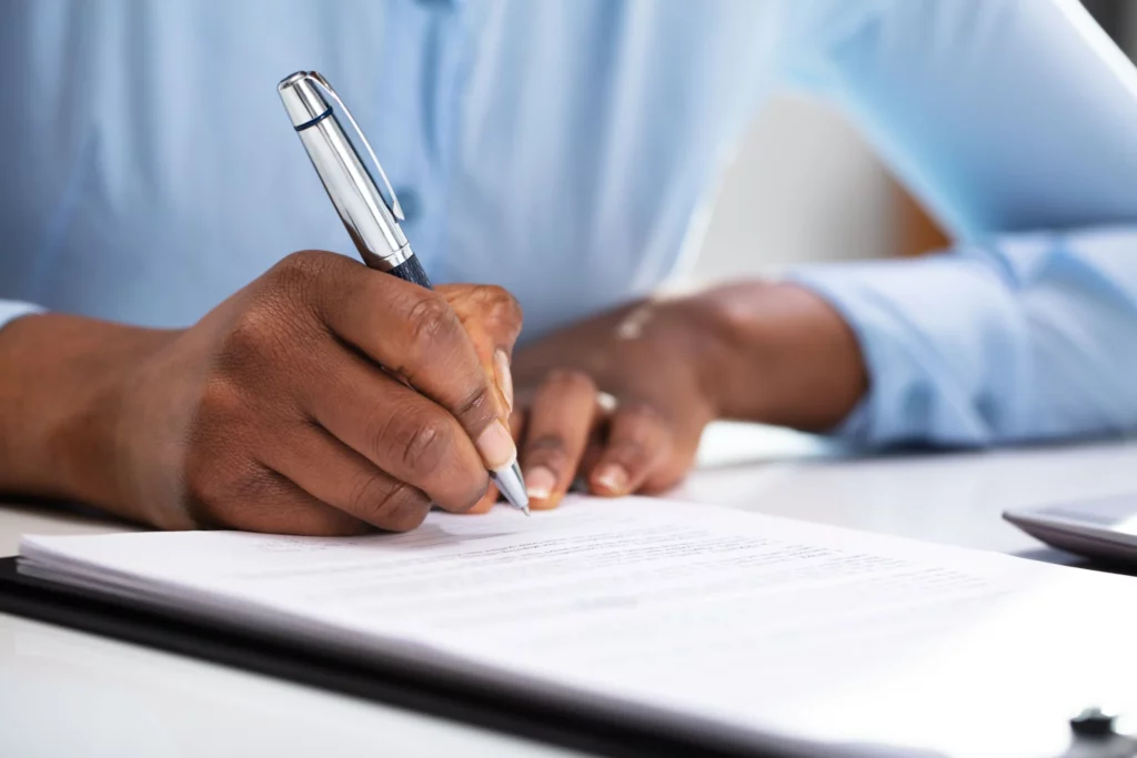 man filling out a form